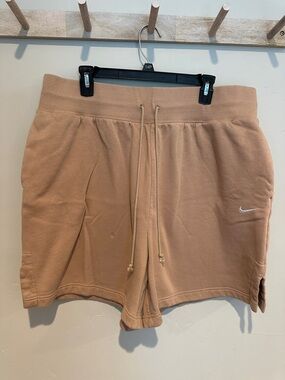 Nike Women's Tan Drawstring Athletic Shorts with White Swoosh